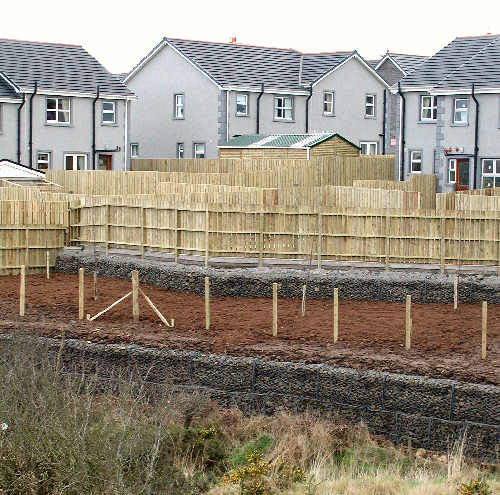 Vertical gabions where it should be a slope