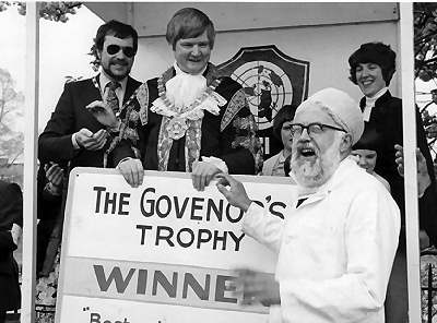 Brian collects the prize